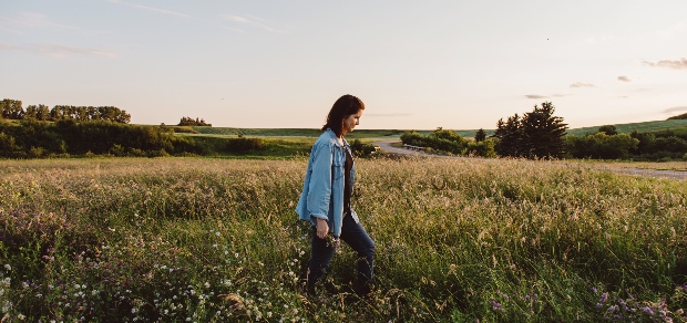 woman walking in a field