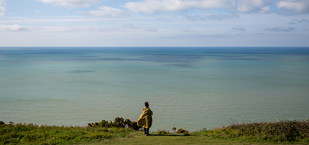 woman looking out at the sea