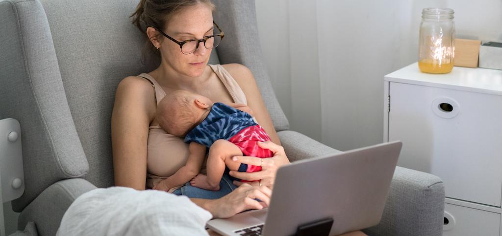 Woman with sleeping baby. 