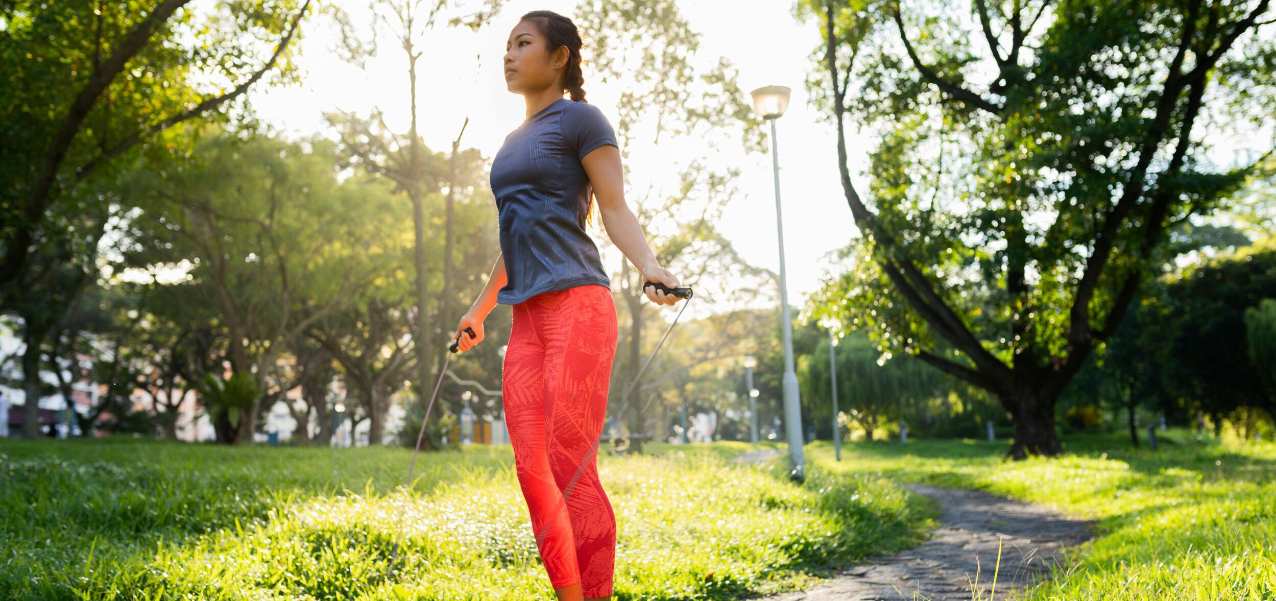 woman jumping rope outside