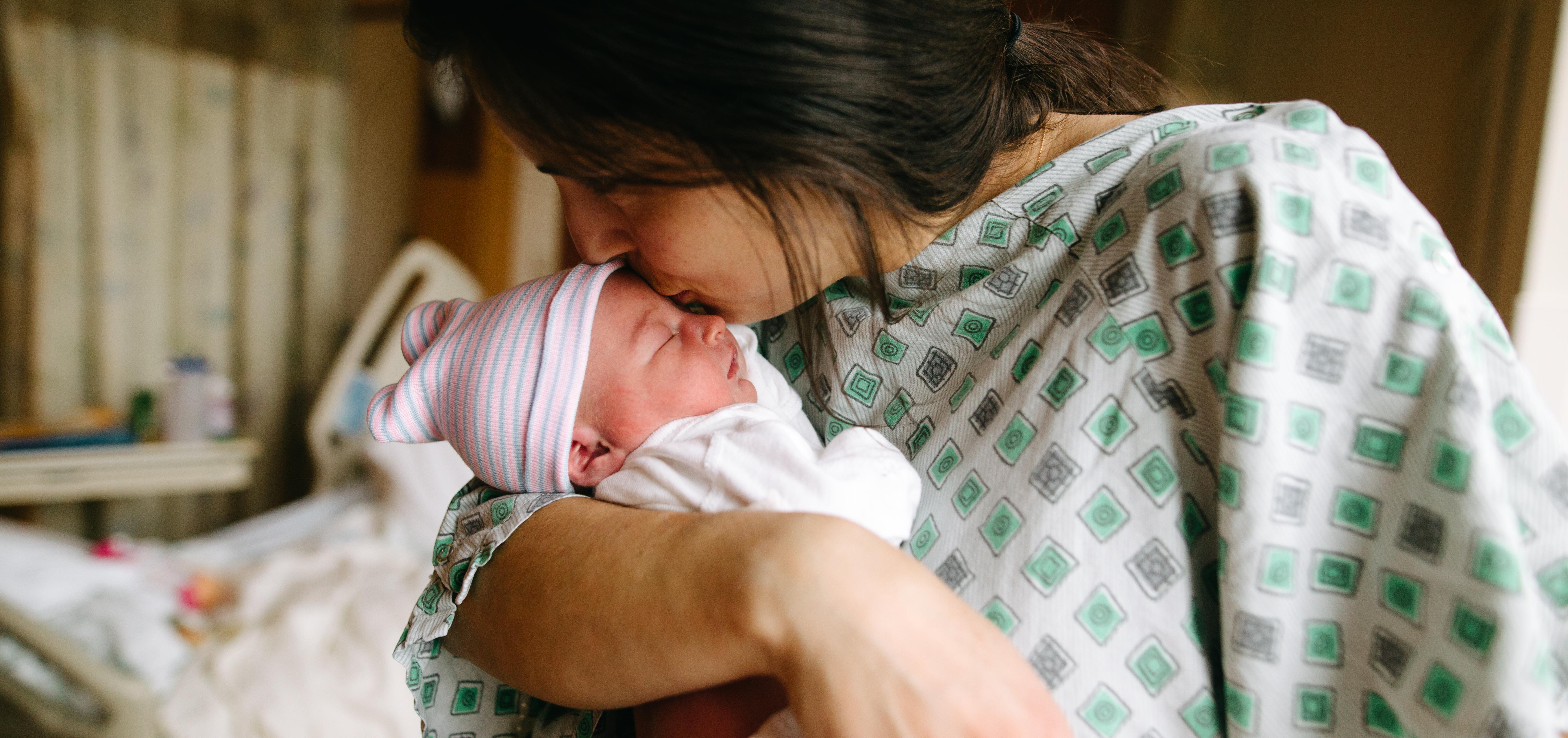 Woman with newborn. 