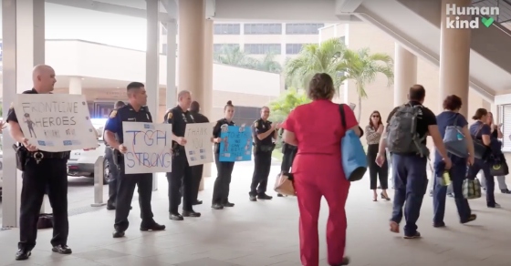 Police Cheering Police Officers Surprise Medical Workers with a Round of Applause