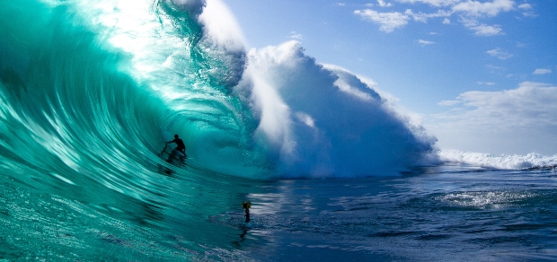 man riding a wave